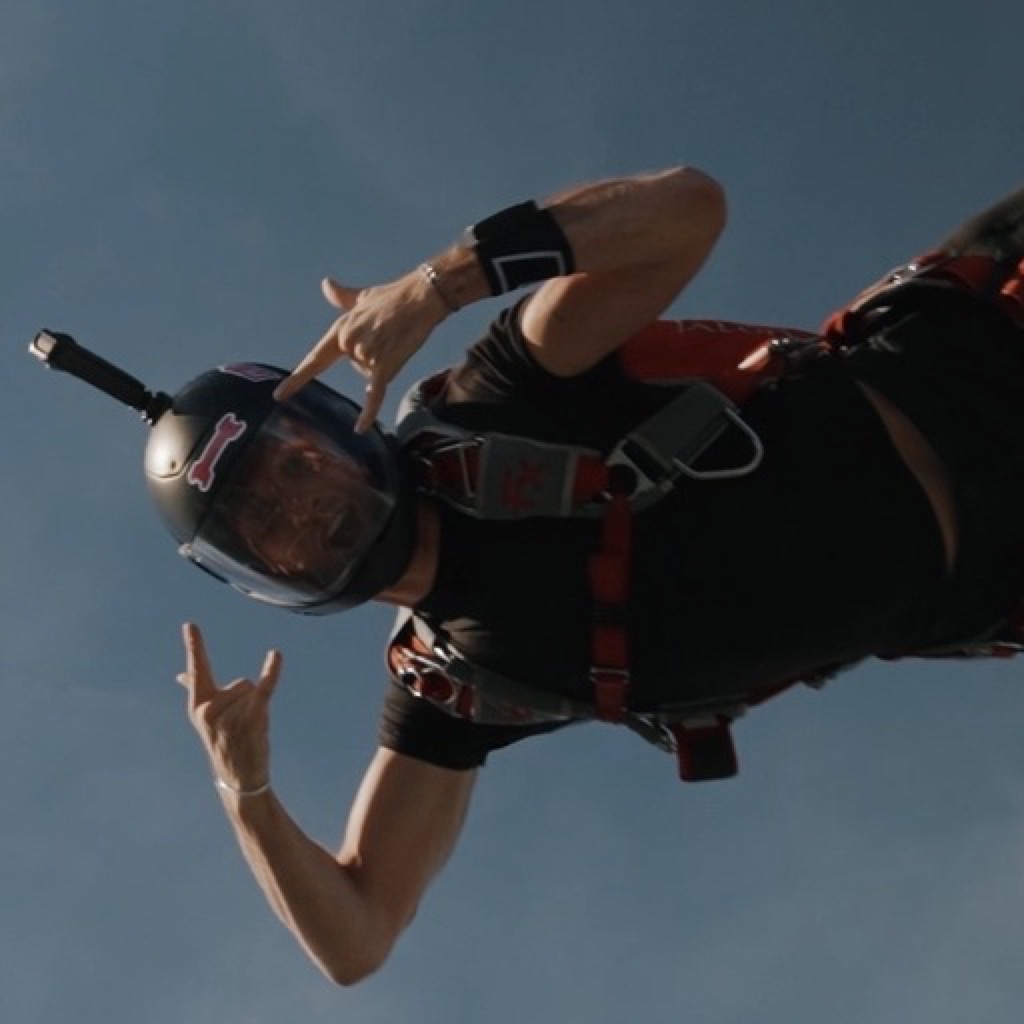 Sam Posthuma, founder of Limitless Growth, skydiving in freefall
